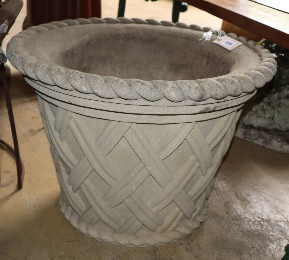 A cast stone garden planter, diameter 54cm, H.39cm
